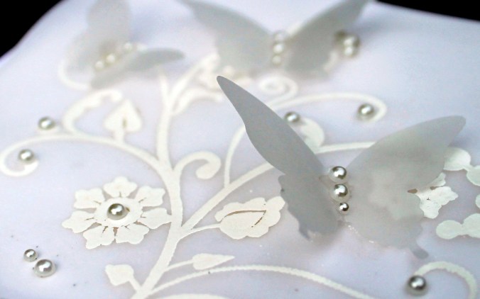 sheer white flourishes and butterflies closeup2