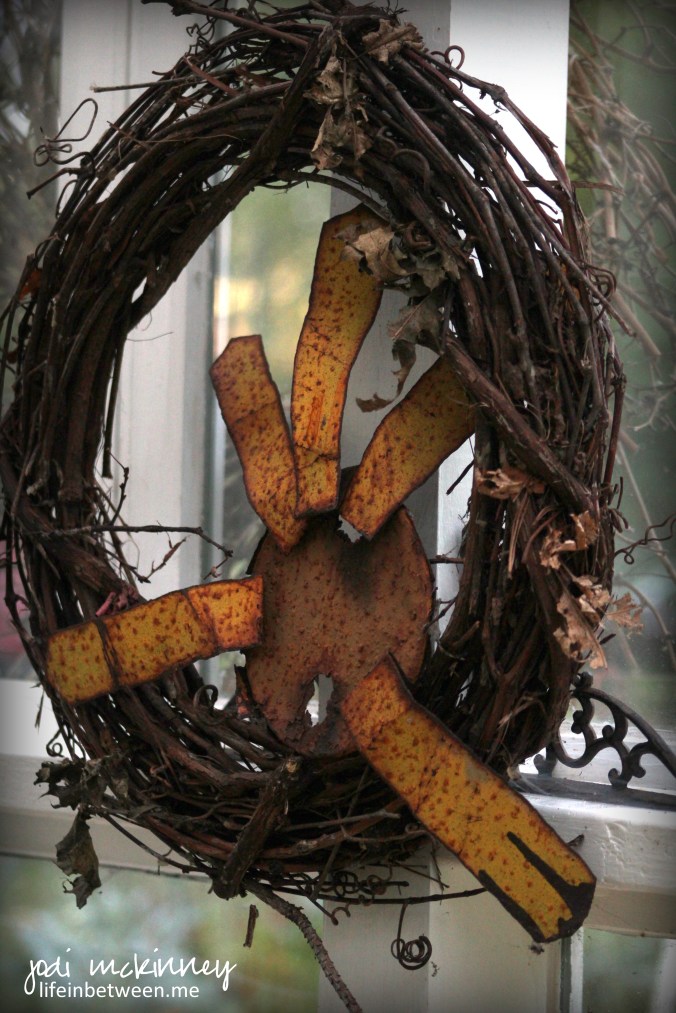 rusty sun grapevine wreath