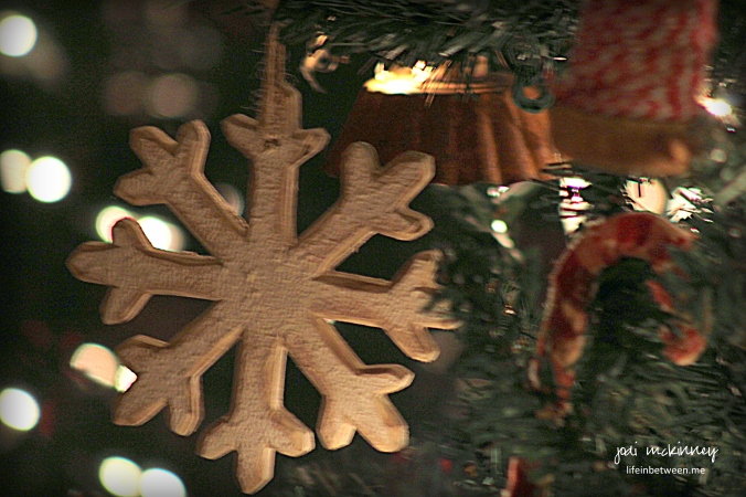 Wooden snowflake on christmas tree 2015