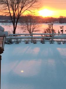 conneat lake snowy sunrise photo